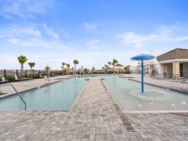 1345 Griffon Ave, Lake Alfred, FL 33850 - community pool with a patio area