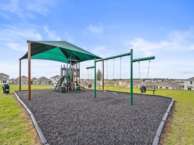 1345 Griffon Ave, Lake Alfred, FL 33850 - community playground with a lawn and a residential view