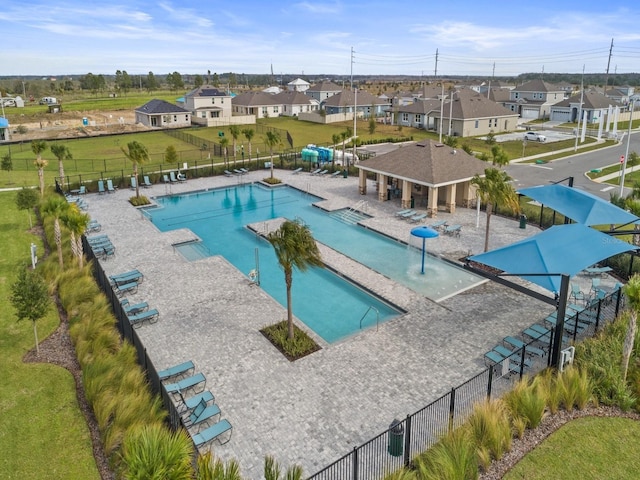 1345 Griffon Ave, Lake Alfred, FL 33850 - community pool with a residential view and a patio