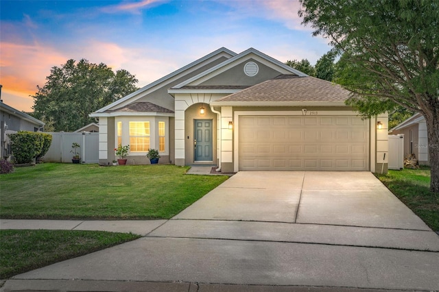 2913 Wilshire Rd, Clermont, FL 34714 - view of front of property with stucco siding, driveway, a garage, and roof with shingles
