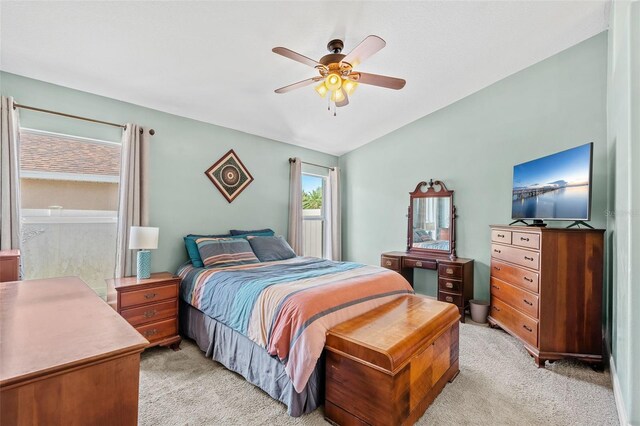 2913 Wilshire Rd, Clermont, FL 34714 - bedroom with light colored carpet and ceiling fan