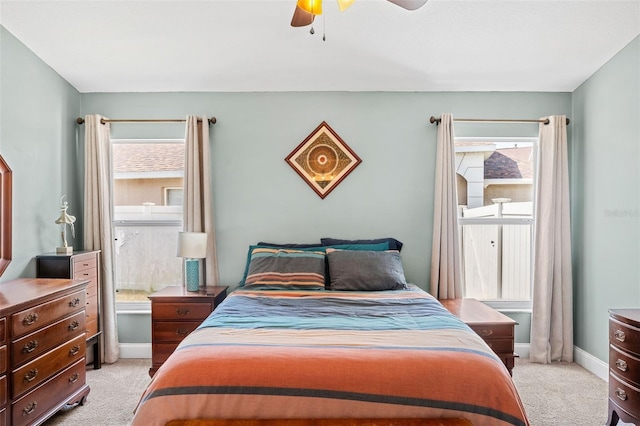 2913 Wilshire Rd, Clermont, FL 34714 - bedroom with light colored carpet and ceiling fan