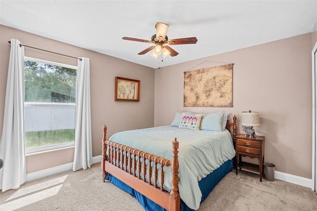 2913 Wilshire Rd, Clermont, FL 34714 - carpeted bedroom with baseboards and a ceiling fan