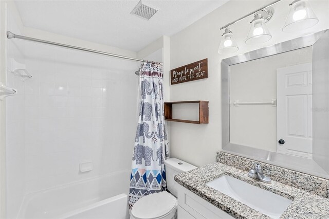 2913 Wilshire Rd, Clermont, FL 34714 - full bathroom featuring vanity and shower / bath combo