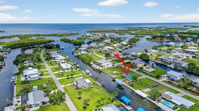 24277 Treasure Island Blvd, Punta Gorda, FL 33955 - aerial view of residential area with a large body of water