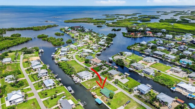24277 Treasure Island Blvd, Punta Gorda, FL 33955 - aerial overview of property's location with a nearby body of water and nearby suburban area