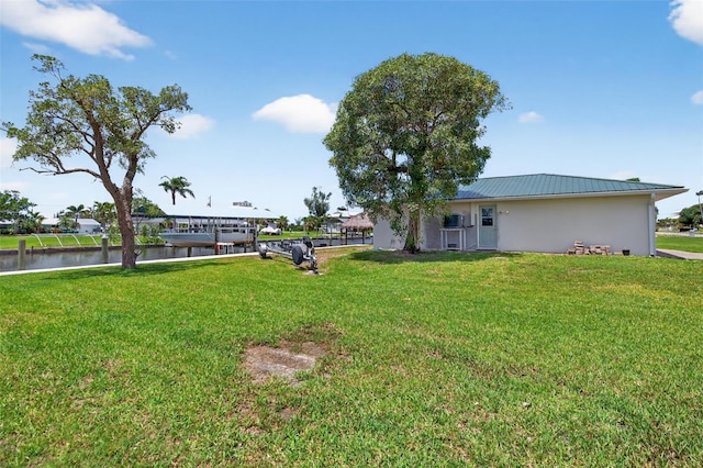 24277 Treasure Island Blvd, Punta Gorda, FL 33955 - view of grassy yard featuring a water view