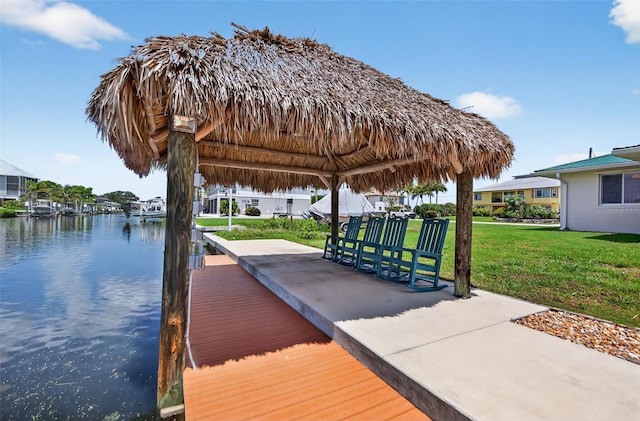 24277 Treasure Island Blvd, Punta Gorda, FL 33955 - dock featuring a yard, a water view, and a gazebo