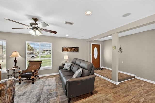 24277 Treasure Island Blvd, Punta Gorda, FL 33955 - living room featuring wood finished floors, ceiling fan, and recessed lighting
