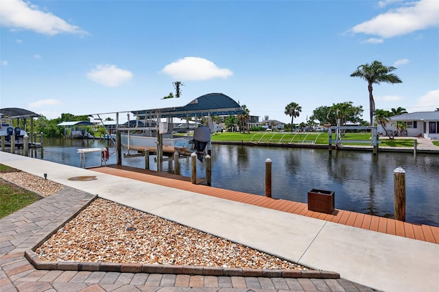 24277 Treasure Island Blvd, Punta Gorda, FL 33955 - dock featuring boat lift and a water view