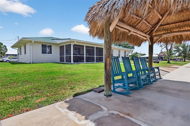 24277 Treasure Island Blvd, Punta Gorda, FL 33955 - view of jungle gym featuring a yard and a sunroom