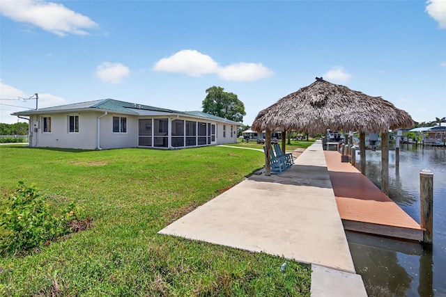 24277 Treasure Island Blvd, Punta Gorda, FL 33955 - dock area with a gazebo, a yard, and a water view