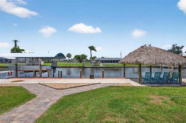 24277 Treasure Island Blvd, Punta Gorda, FL 33955 - dock with a lawn, a water view, and boat lift