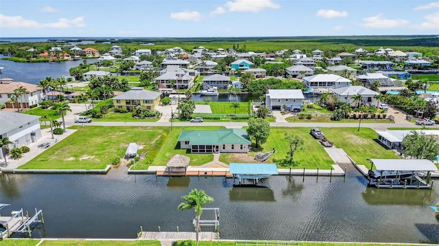 24277 Treasure Island Blvd, Punta Gorda, FL 33955 - aerial view of residential area with a nearby body of water