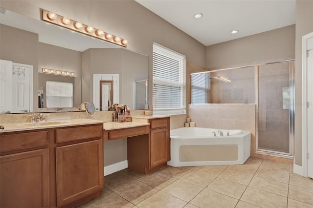 2313 Pesaro Cir, Ocoee, FL 34761 - full bath featuring tile patterned flooring, a bath, vanity, and a shower stall
