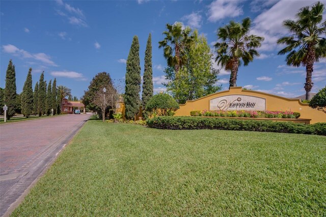2313 Pesaro Cir, Ocoee, FL 34761 - community / neighborhood sign featuring a lawn