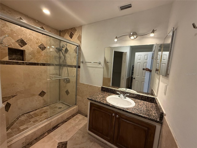 4756 Walden Cir Unit 21, Orlando, FL 32811 - bathroom featuring a shower stall and vanity