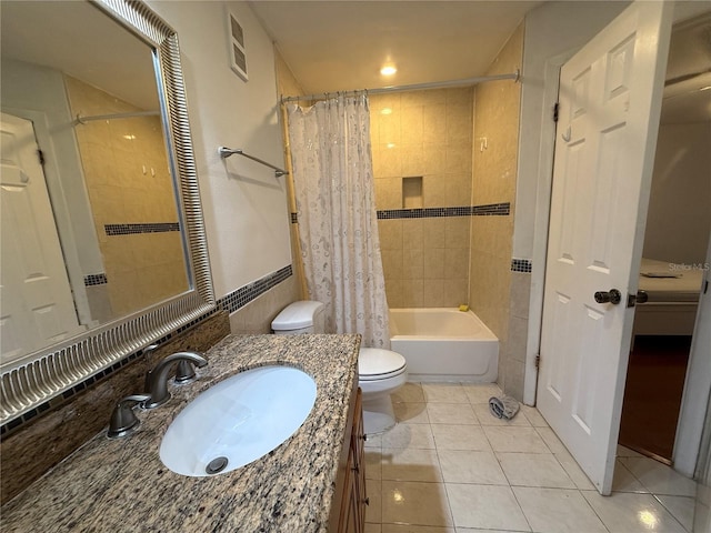 4756 Walden Cir Unit 21, Orlando, FL 32811 - bathroom with toilet, vanity, tile patterned flooring, and shower / tub combo