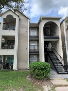 4756 Walden Cir Unit 21, Orlando, FL 32811 - view of property with stairs