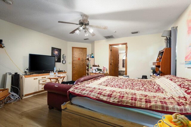 4933 Round Lake Rd, Apopka, FL 32712 - bedroom featuring wood finished floors and a ceiling fan