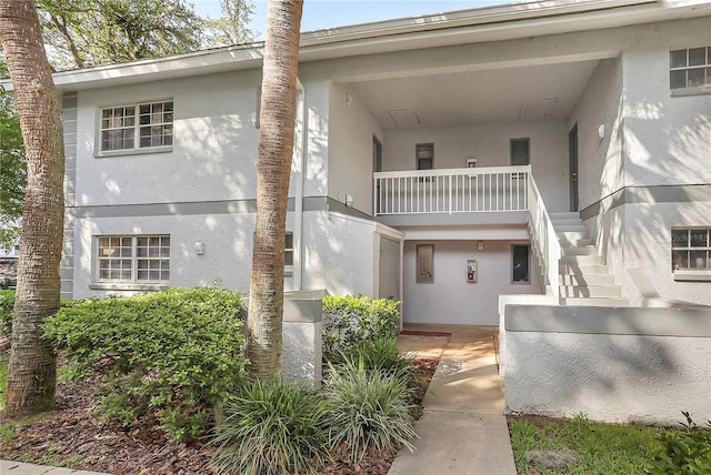 563 Midway Trak Unit K102, Ocala, FL 34472 - view of property featuring stairway