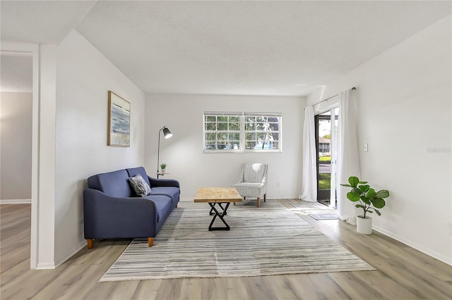 563 Midway Trak Unit K102, Ocala, FL 34472 - living area with light wood finished floors and baseboards