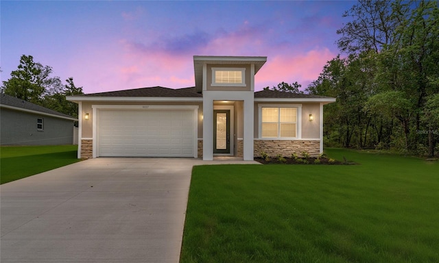 16357 SE 88th Ct, Summerfield, FL 34491 - prairie-style house featuring stone siding, driveway, a garage, and a front lawn