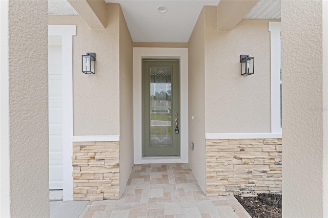 16357 SE 88th Ct, Summerfield, FL 34491 - doorway to property with stone siding and stucco siding