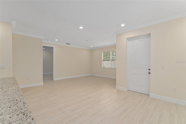 16357 SE 88th Ct, Summerfield, FL 34491 - empty room with crown molding, recessed lighting, baseboards, and light wood-type flooring