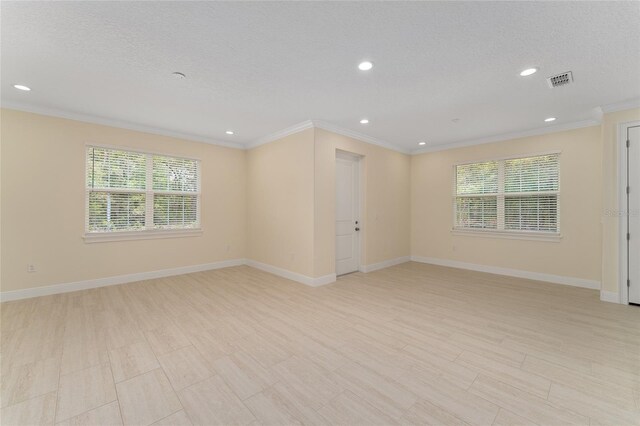 16357 SE 88th Ct, Summerfield, FL 34491 - unfurnished room featuring ornamental molding, healthy amount of natural light, recessed lighting, baseboards, and light wood-style floors