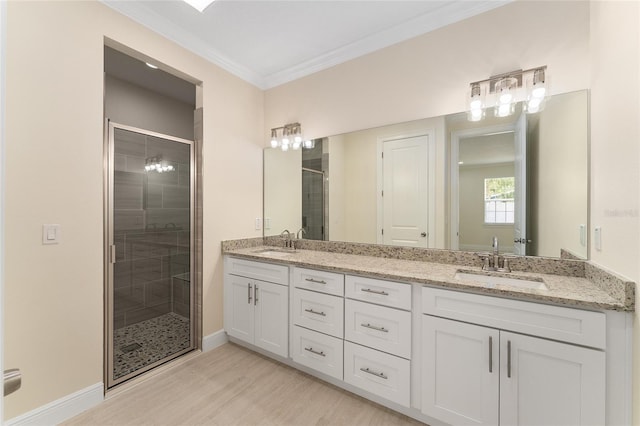16357 SE 88th Ct, Summerfield, FL 34491 - bathroom featuring double vanity, ornamental molding, a stall shower, wood finished floors, and baseboards