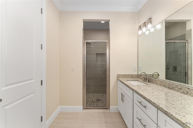 16357 SE 88th Ct, Summerfield, FL 34491 - bathroom with vanity, a stall shower, baseboards, and ornamental molding