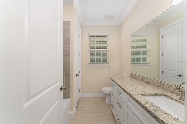 16357 SE 88th Ct, Summerfield, FL 34491 - bathroom with vanity, crown molding, baseboards, toilet, and wood finished floors