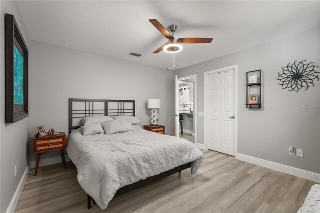 6426 Montclair Bluff Ln, Windermere, FL 34786 - bedroom featuring light wood finished floors, baseboards, and a ceiling fan