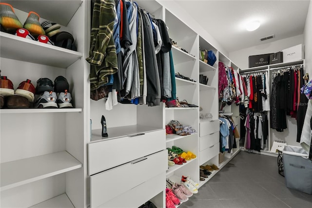 6426 Montclair Bluff Ln, Windermere, FL 34786 - walk in closet with tile patterned flooring