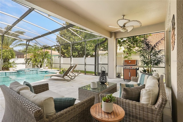 6426 Montclair Bluff Ln, Windermere, FL 34786 - fenced backyard featuring area for grilling, a patio, outdoor lounge area, a ceiling fan, and a pool with connected hot tub