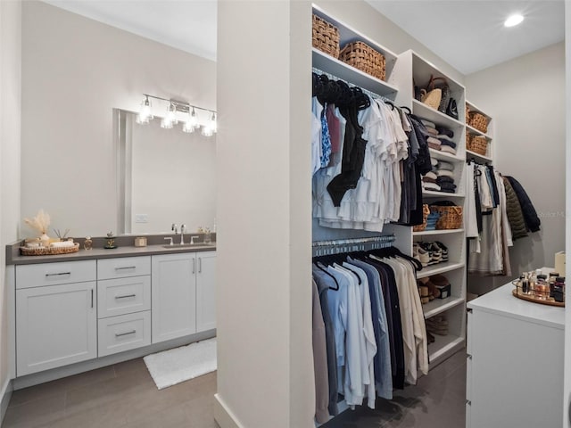 340 Lakeview Rd, Winter Garden, FL 34787 - spacious closet featuring tile patterned floors and bar with sink