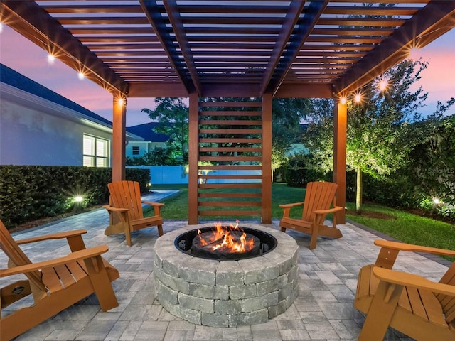 340 Lakeview Rd, Winter Garden, FL 34787 - patio terrace at dusk featuring a fire pit, a patio, and a pergola