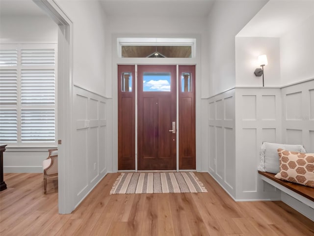 340 Lakeview Rd, Winter Garden, FL 34787 - entrance foyer featuring a decorative wall, a wainscoted wall, and light wood-style flooring