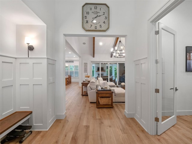 340 Lakeview Rd, Winter Garden, FL 34787 - living room with light wood-style floors, a chandelier, recessed lighting, a towering ceiling, and beamed ceiling