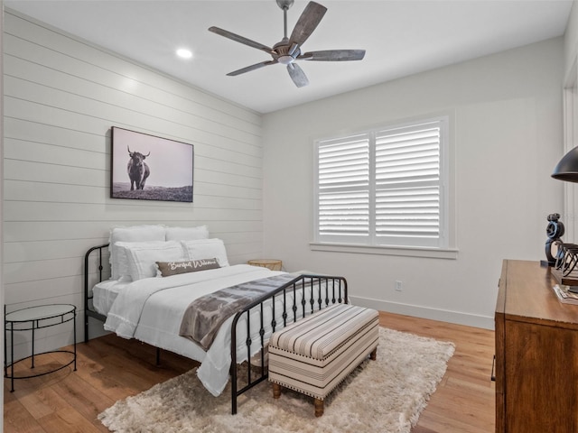 340 Lakeview Rd, Winter Garden, FL 34787 - bedroom featuring light wood-style flooring, wooden walls, recessed lighting, and a ceiling fan