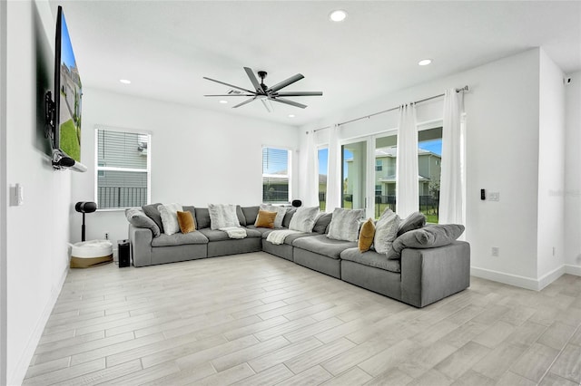 5609 Zestar Ln, Loxahatchee, FL 33470 - living area with light wood-style flooring, ceiling fan, baseboards, and recessed lighting