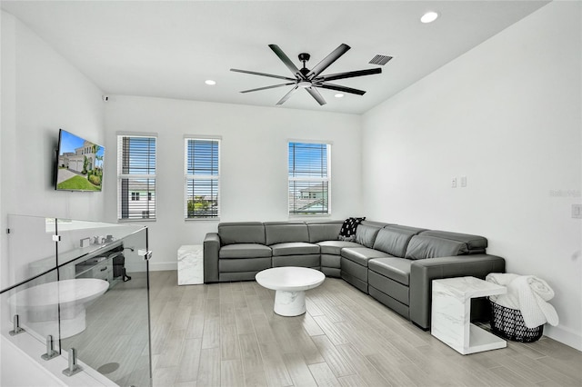 5609 Zestar Ln, Loxahatchee, FL 33470 - living area featuring ceiling fan, light wood finished floors, baseboards, and recessed lighting