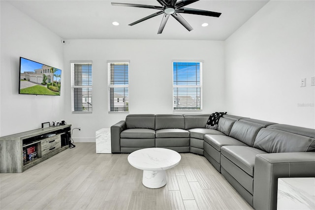 5609 Zestar Ln, Loxahatchee, FL 33470 - living room featuring healthy amount of natural light, a ceiling fan, light wood-style floors, recessed lighting, and baseboards