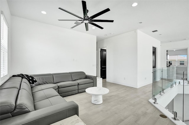 5609 Zestar Ln, Loxahatchee, FL 33470 - living room featuring ceiling fan, recessed lighting, and light wood-style flooring