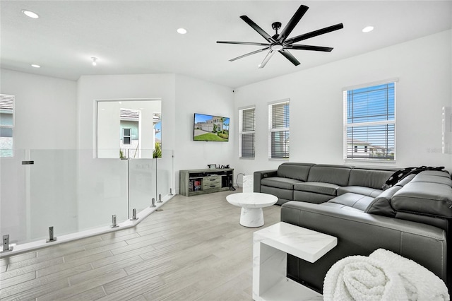 5609 Zestar Ln, Loxahatchee, FL 33470 - living room with light wood-type flooring, ceiling fan, and recessed lighting