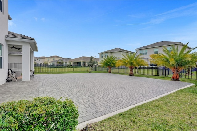5609 Zestar Ln, Loxahatchee, FL 33470 - view of patio / terrace featuring ceiling fan and a residential view