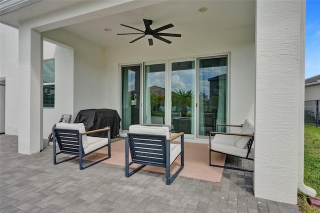 5609 Zestar Ln, Loxahatchee, FL 33470 - view of patio with a ceiling fan, an outdoor hangout area, and a grill