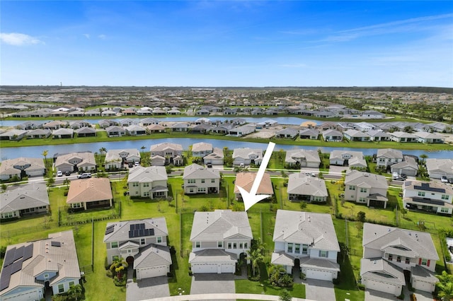 5609 Zestar Ln, Loxahatchee, FL 33470 - aerial perspective of suburban area featuring a large body of water