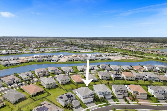 5609 Zestar Ln, Loxahatchee, FL 33470 - aerial overview of property's location with nearby suburban area and a large body of water